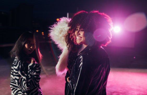 Night scene in black jacket over white fur